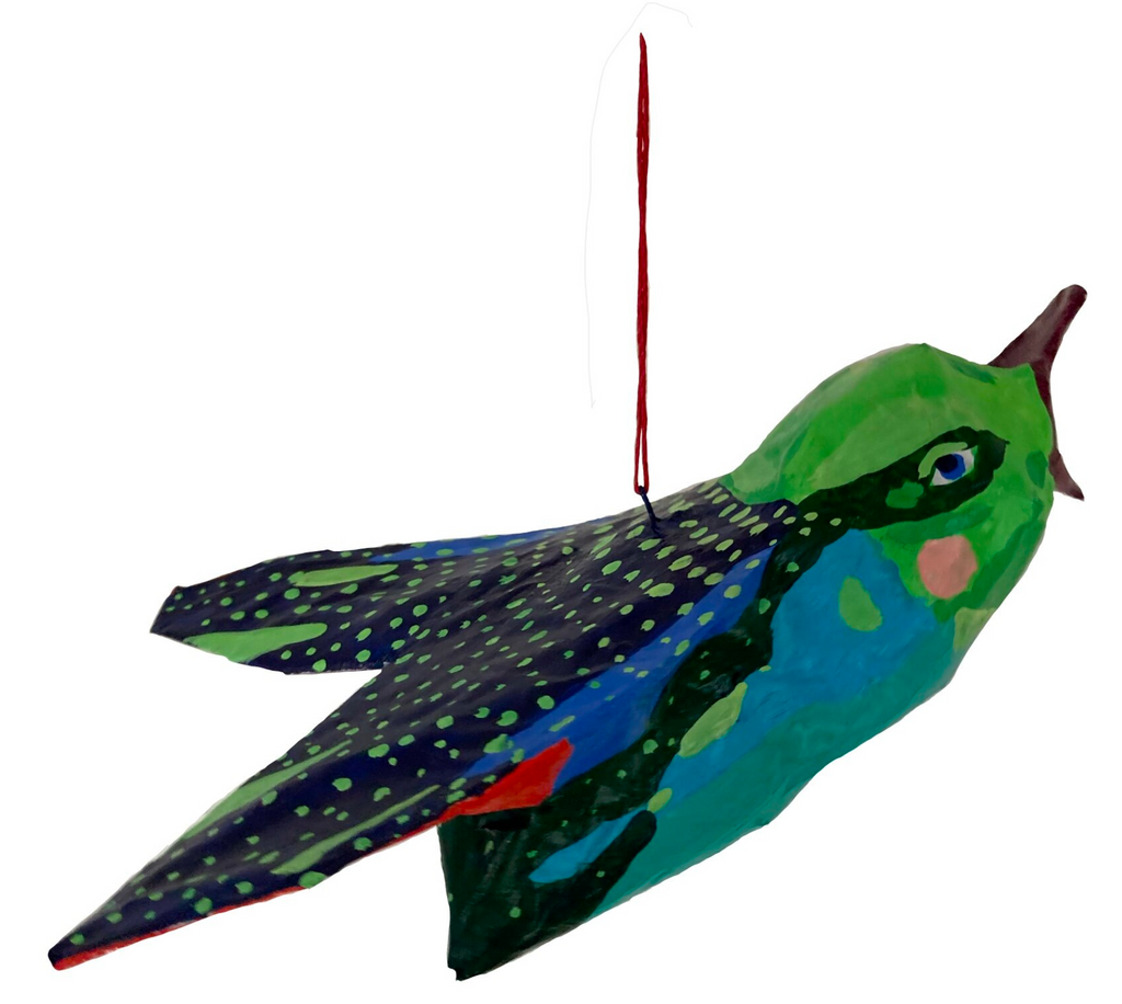 Flying colorful bird, paper mache