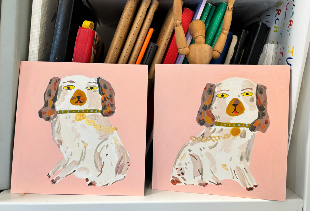 Staffordshire dog statues, coral pink and brown