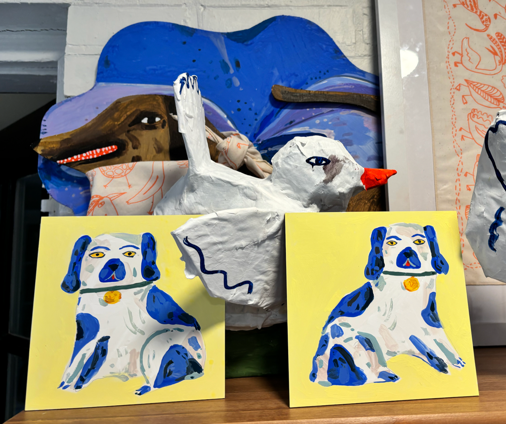 Staffordshire dog statues, blue and yellow