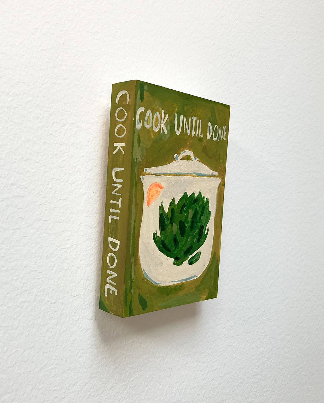 Cook Until Done Cookbook, painting on wood block.